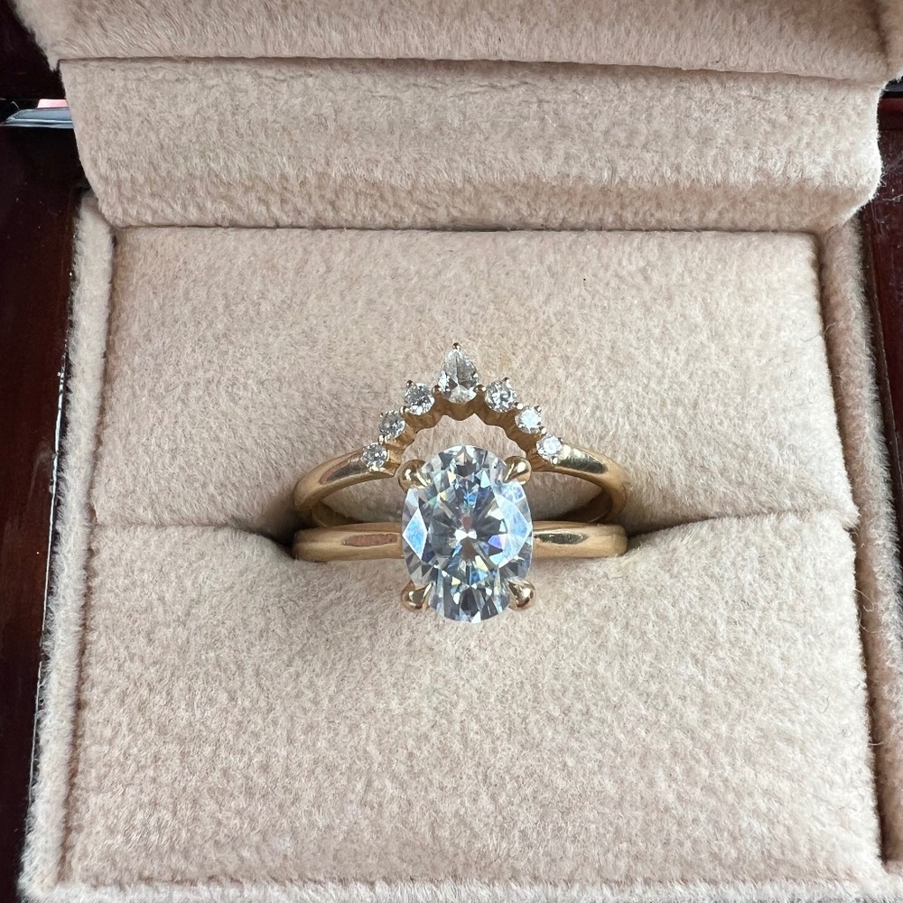 Moissanite engagement ring and diamond wedding band set